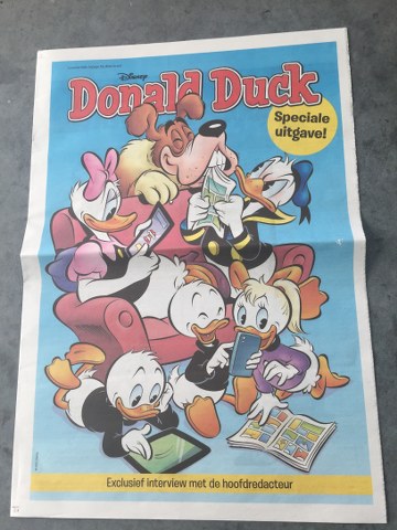 Donald Duck boekje en courant
