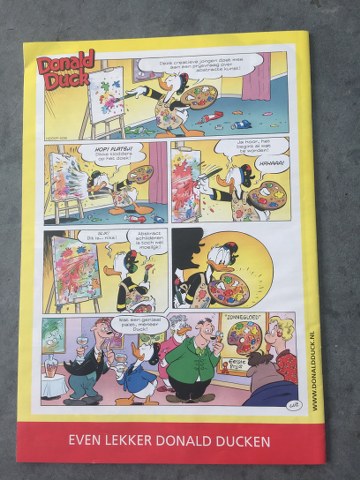 Donald Duck boekje en courant