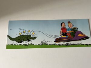 Kaart S&W op schotel met krokodil
